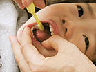 10.下顎右側　乳歯の奥歯の内側の面